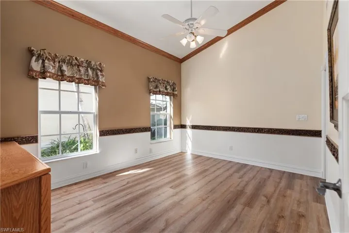 Large den can also be used as a guest room or in-home office.