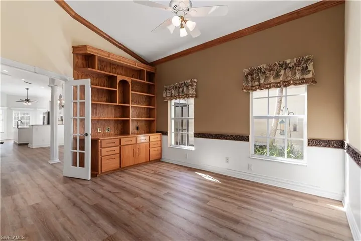 This den/office offers French doors, quality solid wood built-ins. This room can also be used as a third bedroom as it's very large.