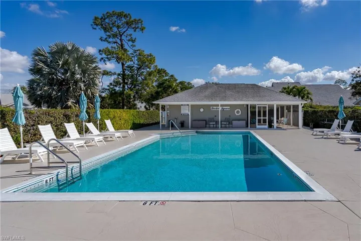 Community pool featuring a patio area