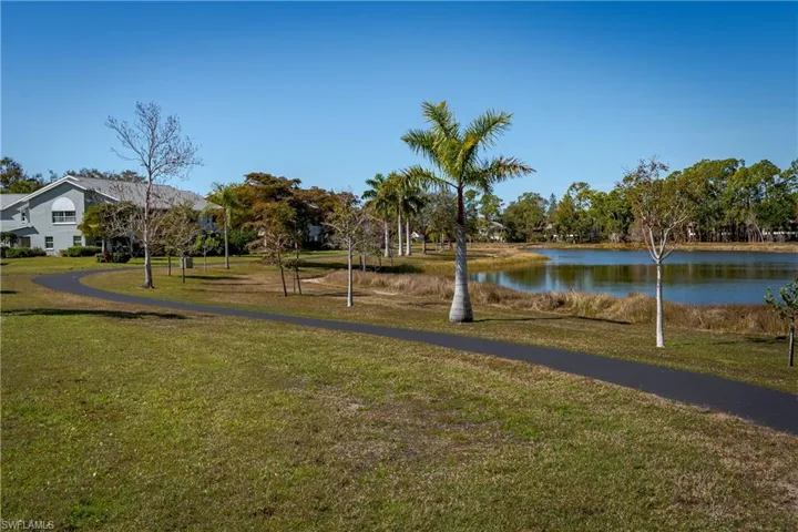 View of home's community with a water view