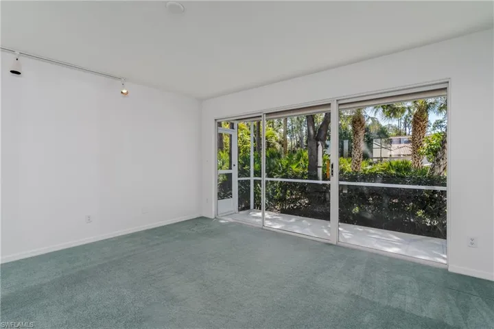 Spare room with carpet flooring and healthy amount of natural light