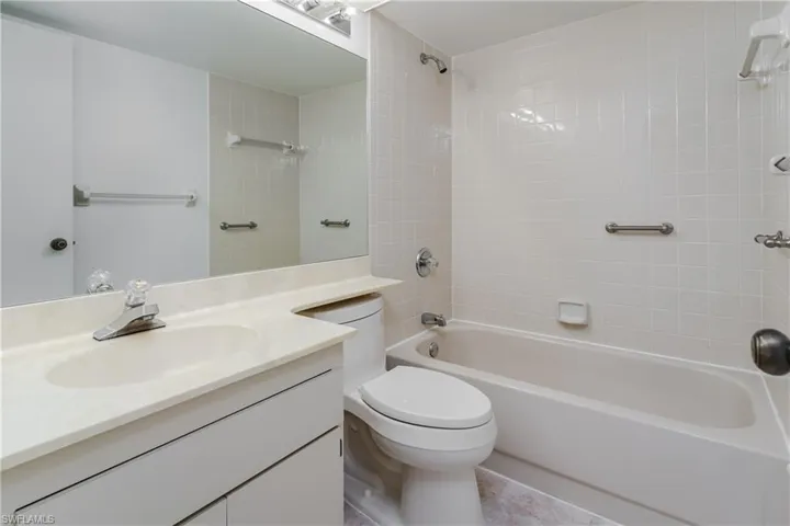 Bathroom featuring vanity and bathtub / shower combination