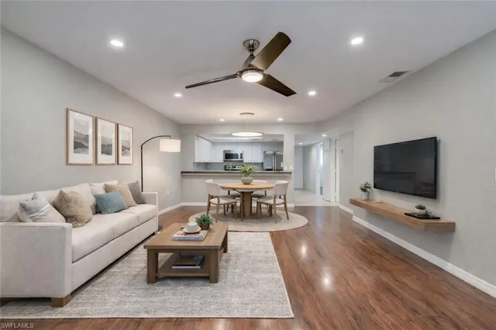 Virtually staged:  Main living dining area with NEW flush mount LED lighting on dimmers.