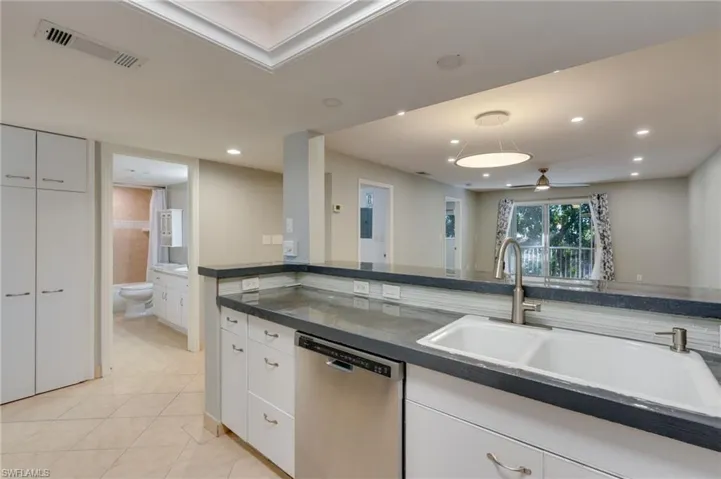 Super functional kitchen with oversized farm sink and new faucet.