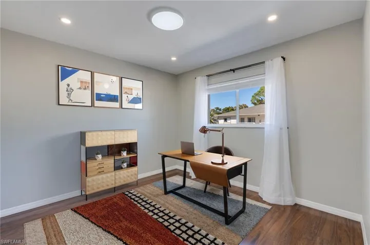 The east bedroom features a new flush mount, LED lighting, and offers the flexibility of a third bedroom, hobby room, or office.