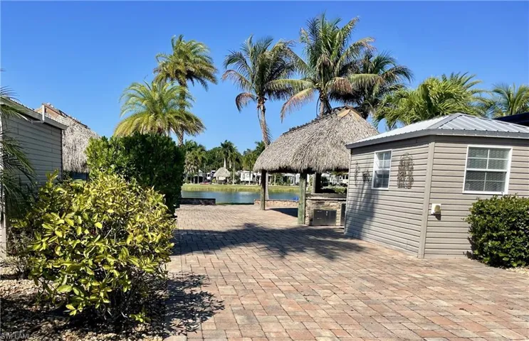 View of patio with a water view