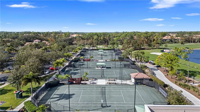 Racquet center features a tennis and pickleball pro shop managing the community’s clay courts, league play, and organized activities.