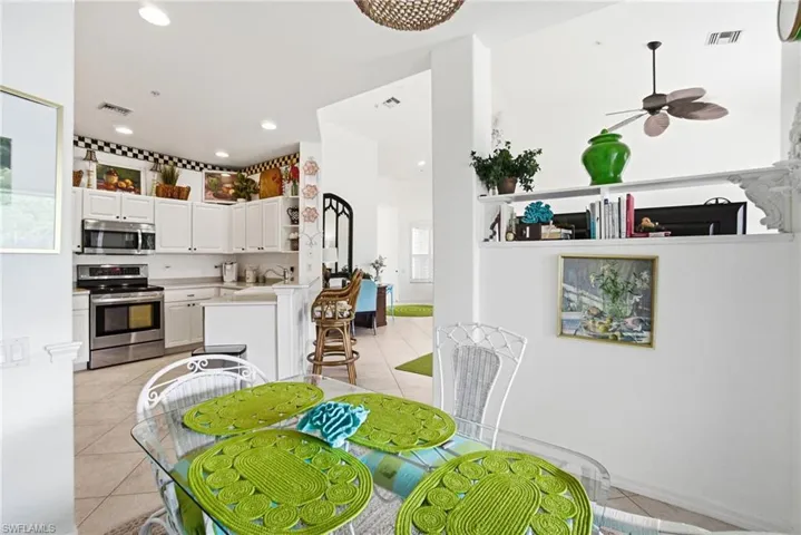 Eat-in kitchen with sliding door that opens to lanai.