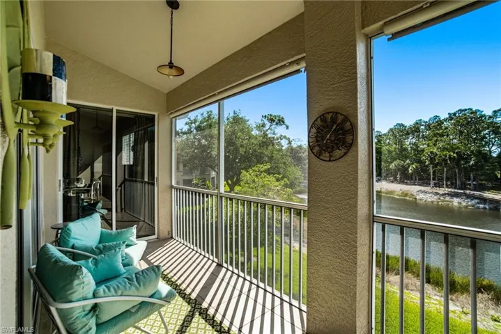 SPECTACULAR LONG VIEWS OF THE GOLF COURSE, LAKE, BRIDGE, AND SCENIC WOODED VISTA!
