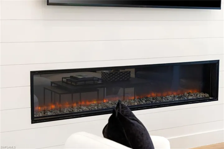 Detailed view of a glass covered fireplace