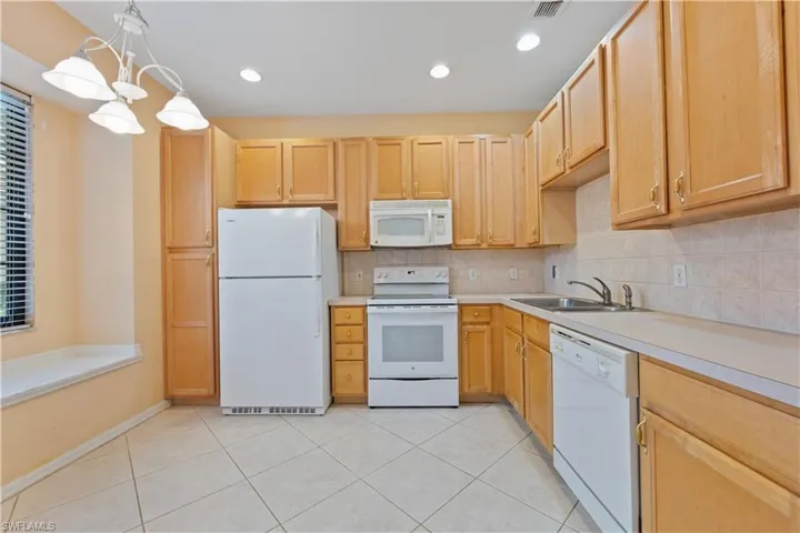 7740  Woodbrook  CIR, Naples, FL 34104