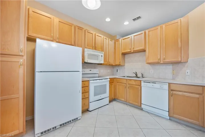 7740  Woodbrook  CIR, Naples, FL 34104