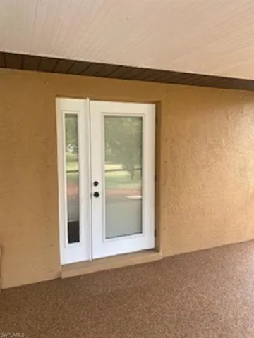 French door from master bedroom to lanai.