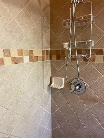 Master bath tiled walk in shower.
