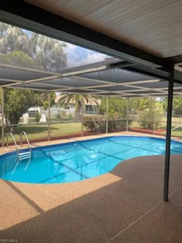 Large screened in pool.