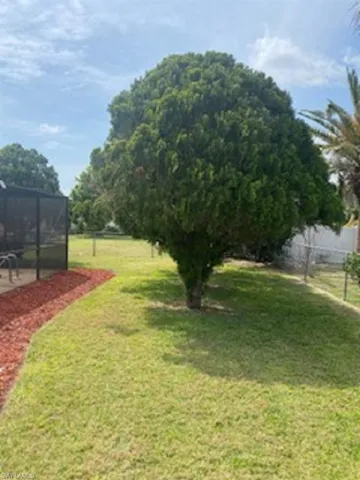 The entire property features beautiful mature landscaping.