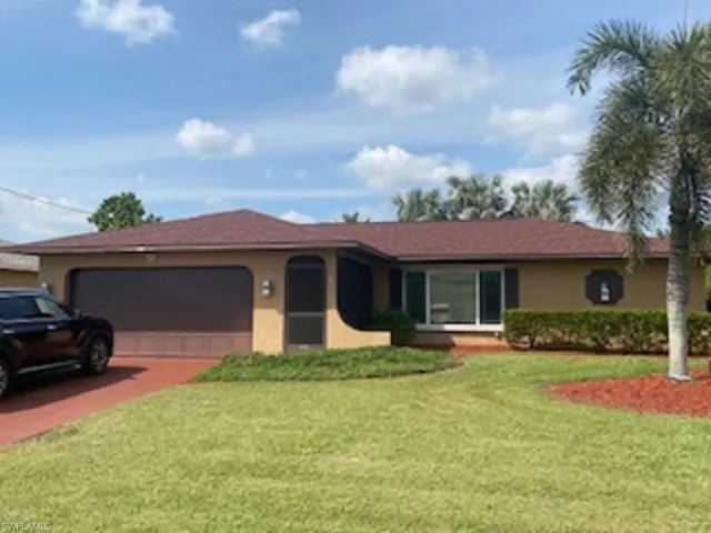 2 car garage with hurricane garage door.