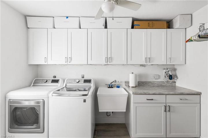 Washer & Dryer are located in the garage. Lots of storage as well in garage.