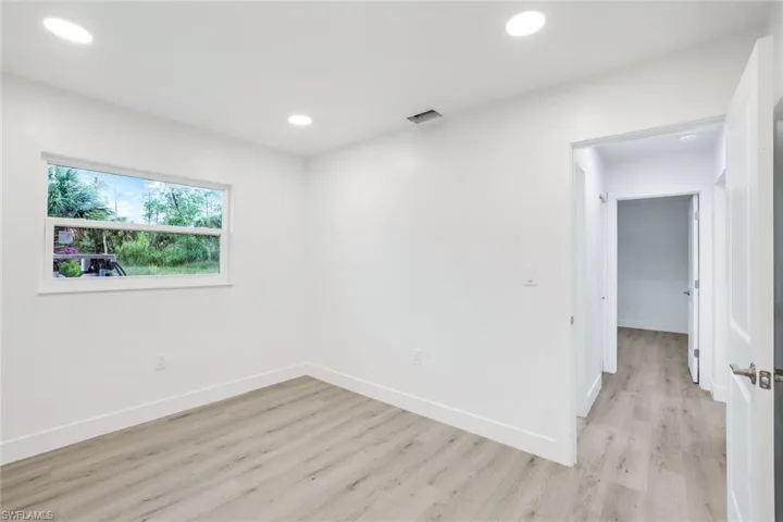 Unfurnished room with recessed lighting and light wood-style floors