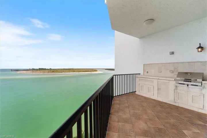 Balcony with outdoor electric grill, Gulf view.