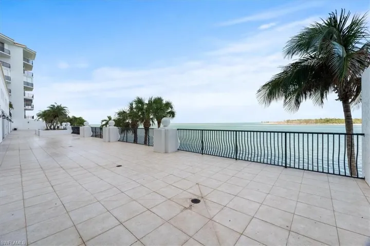 View of public patio with a water view