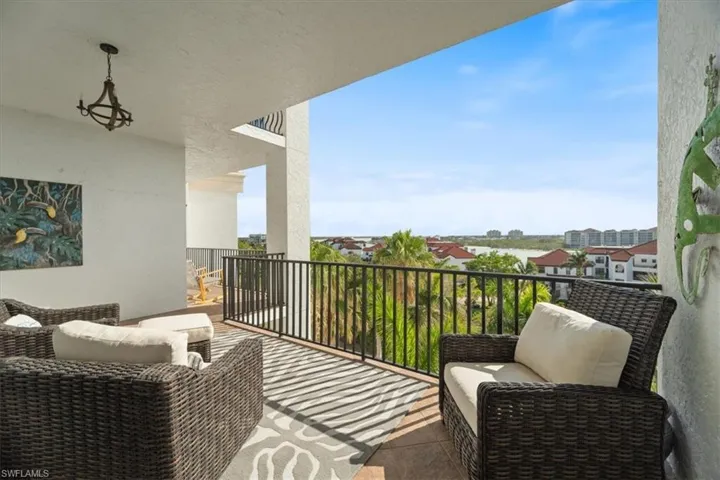 SE Balcony off of living room with canal view.