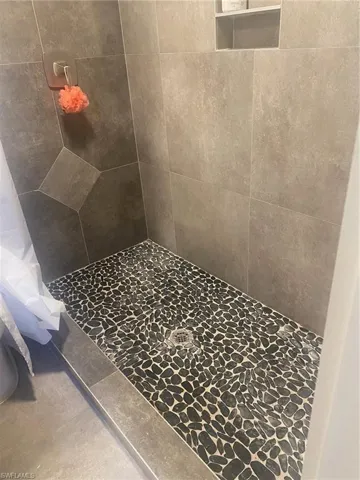 Bathroom featuring a stall shower