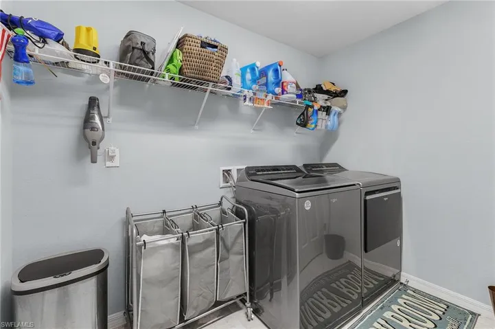Laundry room featuring washer and dryer