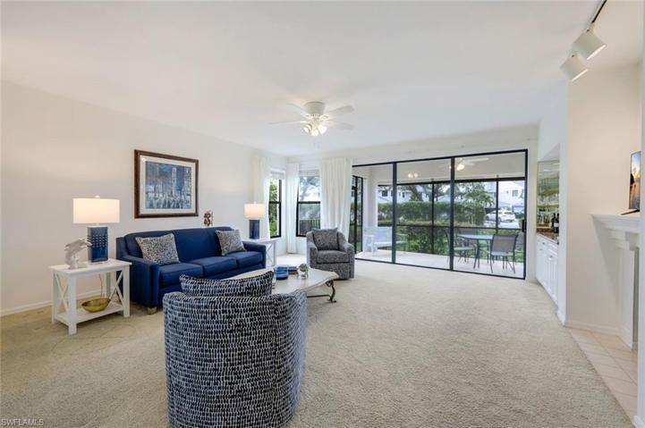 Low Nap Carpet, Tiled Fireplace New Fan/Light, Sliders to Lanai