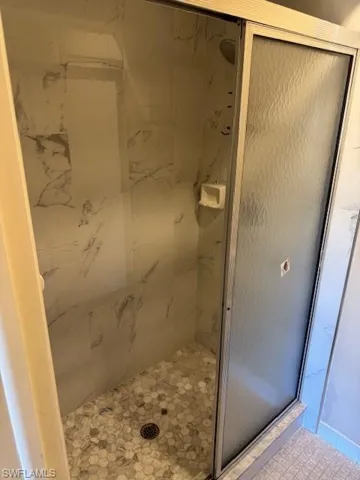 Bathroom with a shower stall