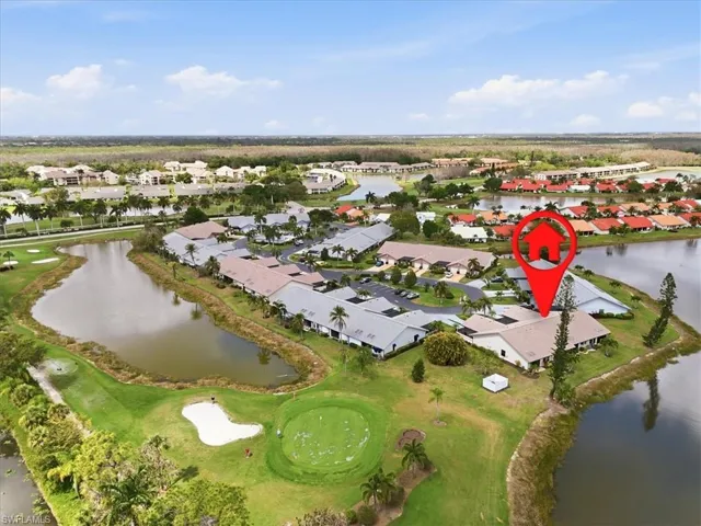 Aerial view of residential area with a nearby body of water