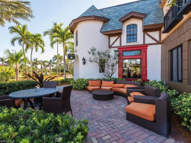 View of patio with an outdoor hangout area