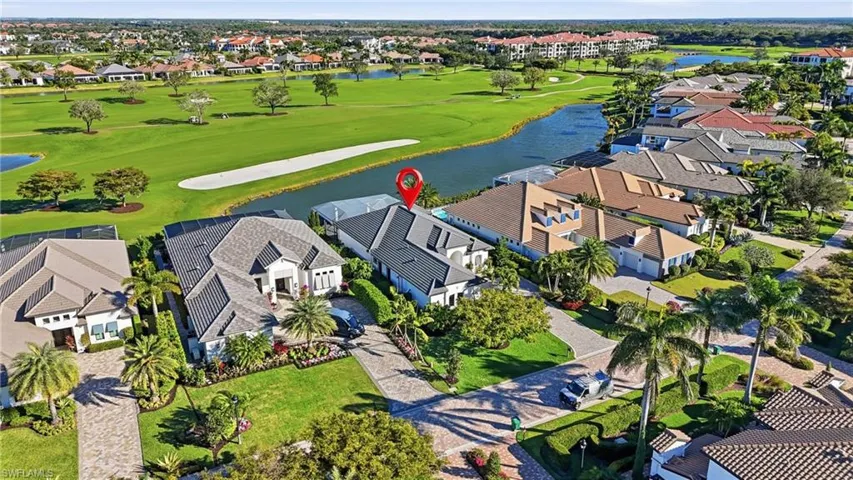 Premium lot with long lake views and Western sunsets overlooking the golf cours