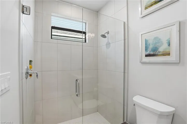 Third bedroom ensuite features a walk in shower