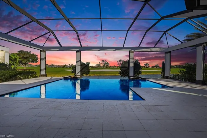 Endless and stunning sunsets can be yours in this stunning Talis Park custom home