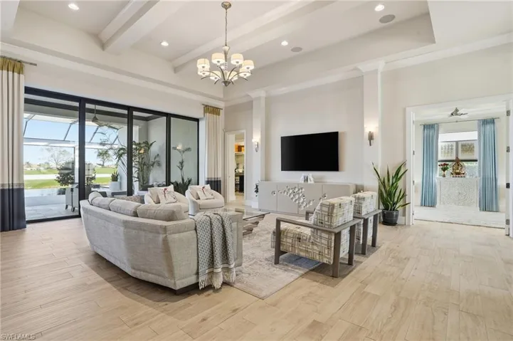 Great room features soaring 14' ceilings
