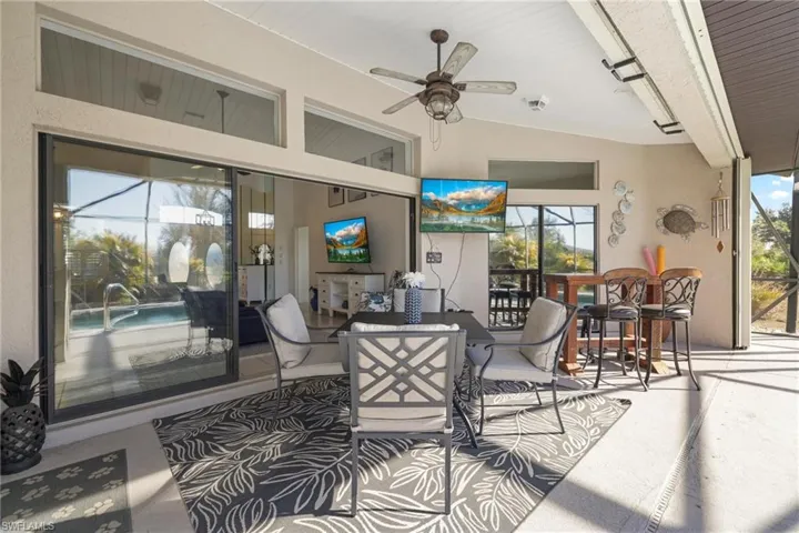 View of patio featuring ceiling fan and outdoor dining space