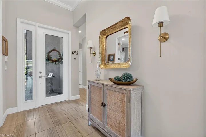 WELCOME to your new home! Spacious foyer and 1st look at gorgeous plank tile flooring!