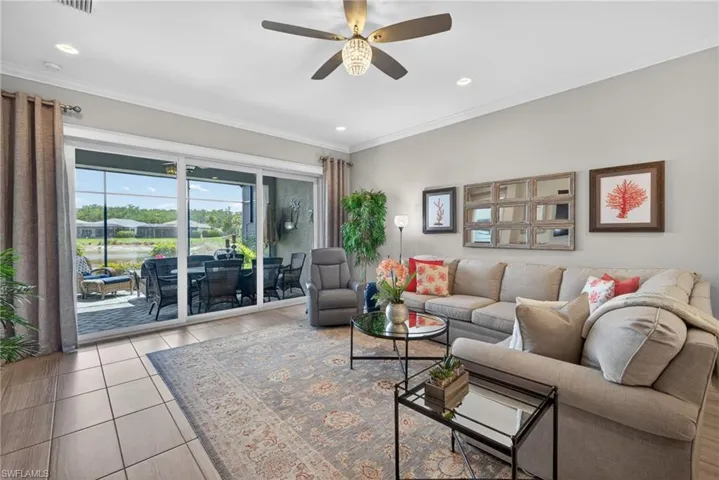 Great room opens off of kitchen and flows into THE maximum allowable expansion of lania for villas...and the cage was expanded as well!