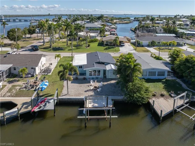 Aerial view of residential area with a nearby body of water