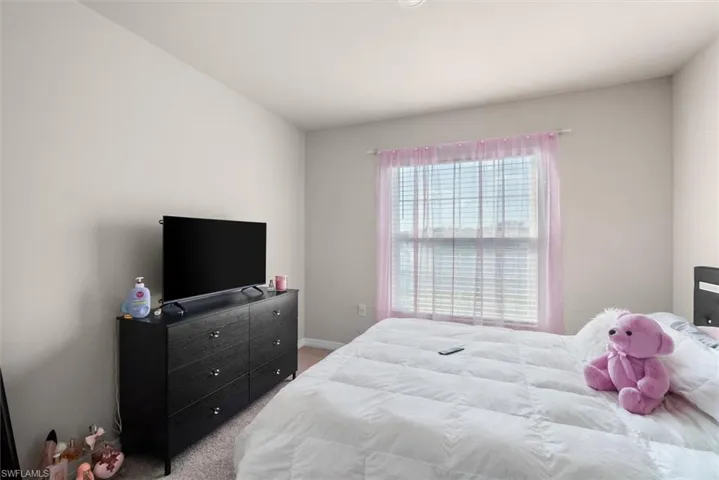 Bedroom with carpet