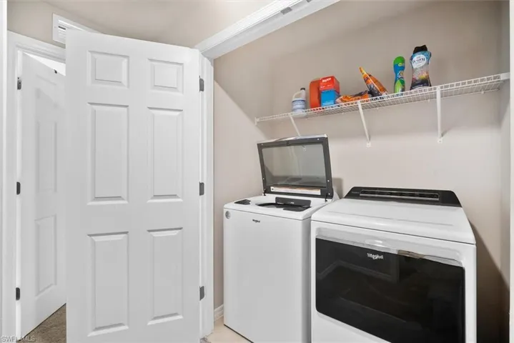 Laundry room with washer and dryer