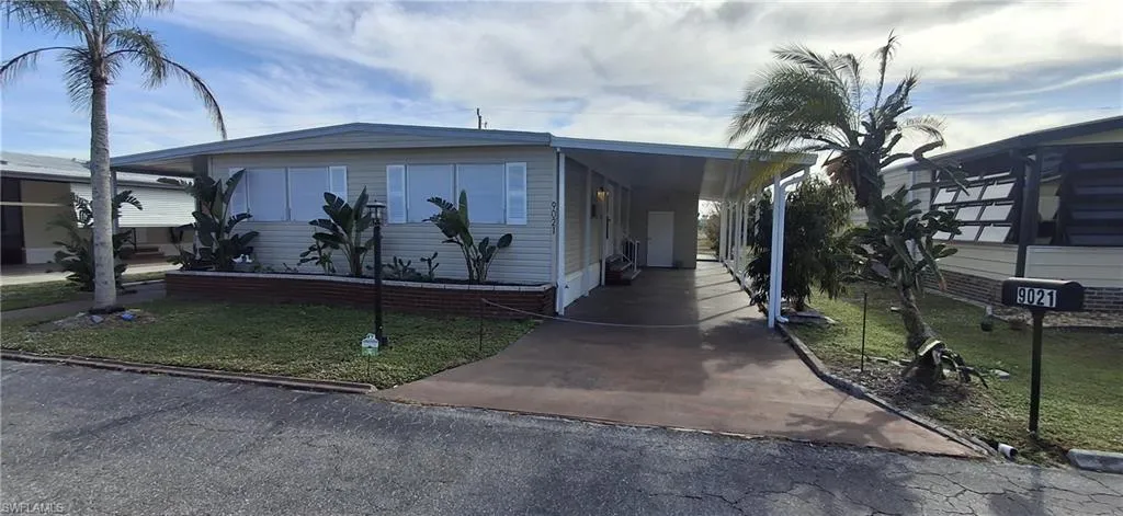 Front of home with Carport and room for two vehicles