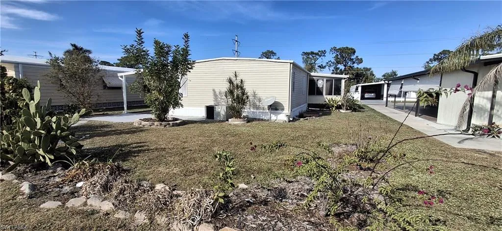 Rear yard view of home