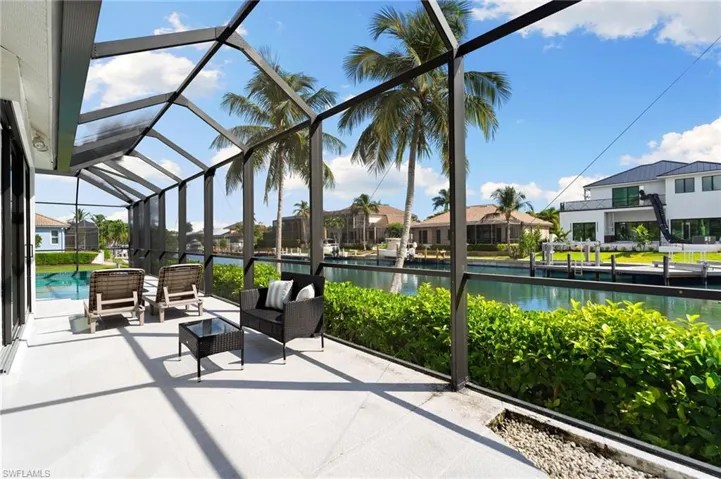 View from the sun filled patio space looking out over the canal.