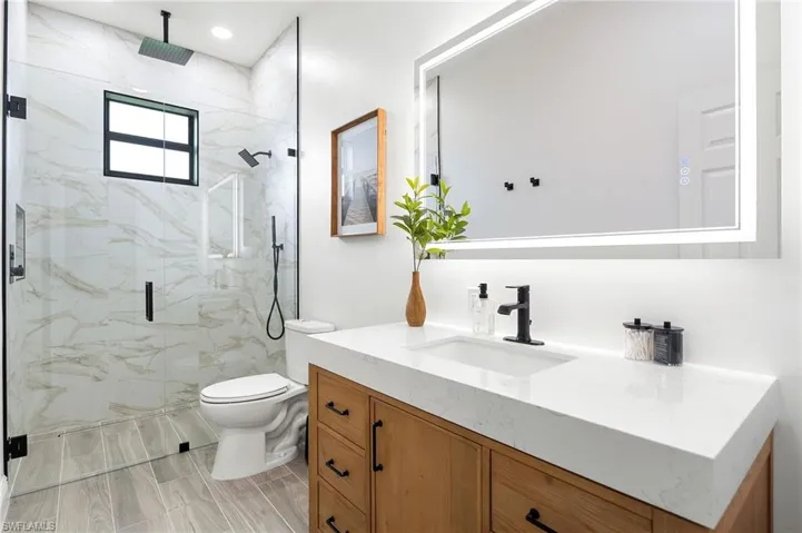 Large guest bathroom has been fully renovated