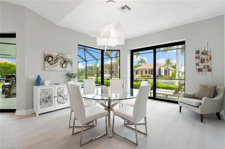 Dining Room view over the pool and canal