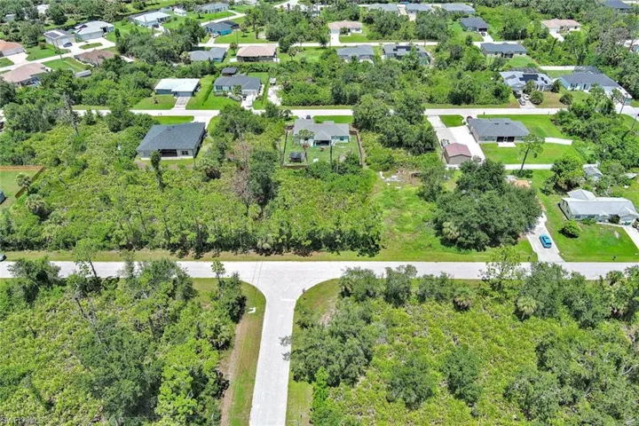 View of property location featuring nearby suburban area