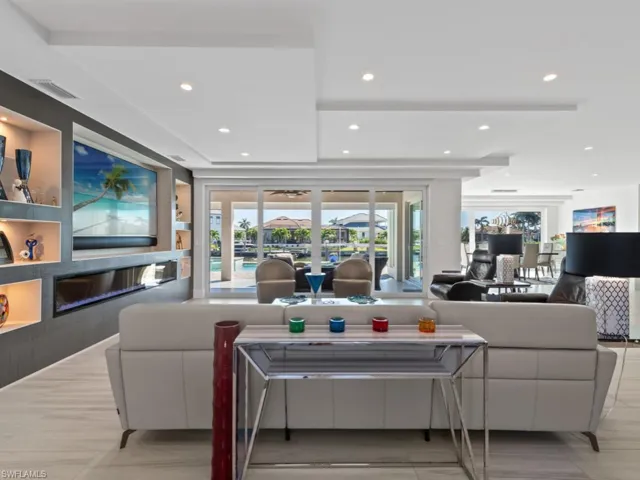 Living room with light tile patterned flooring
