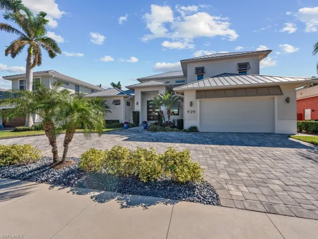View of front of property with a garage